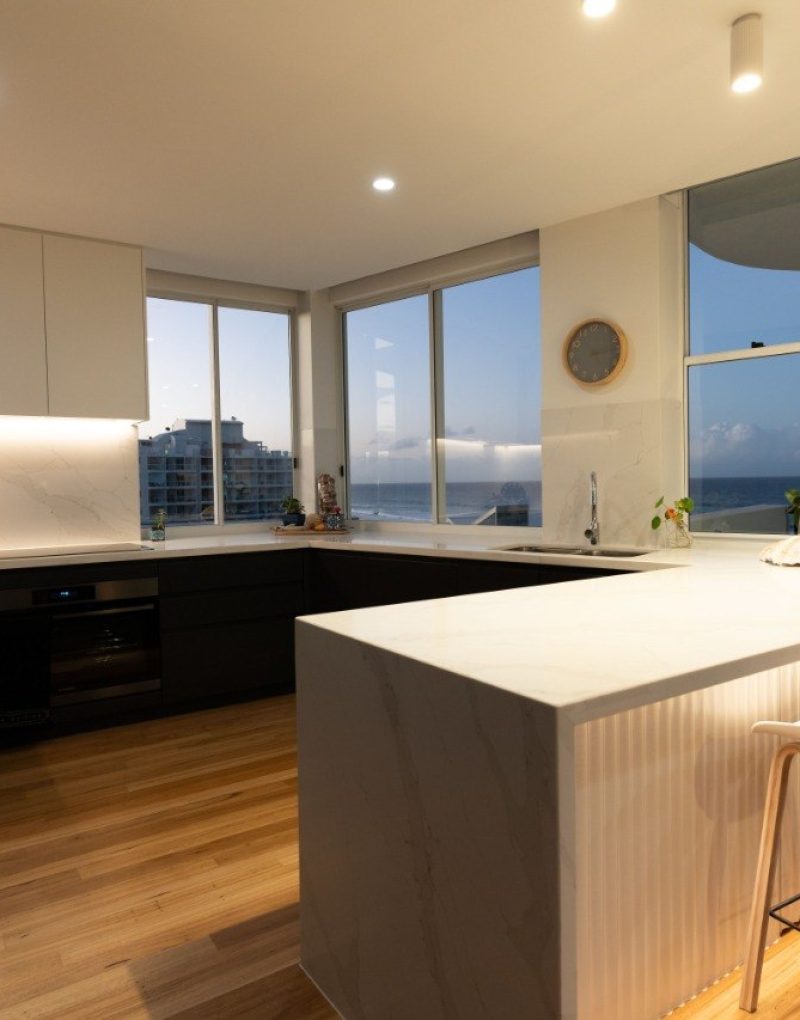 Coastal kitchen renovation open plan with outdoor entertaining